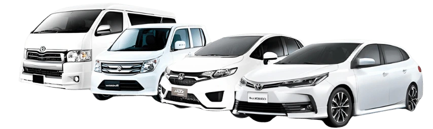 . A Toyota Prius navigates a lakeside road, illustrating a local taxi service in Sri Lanka.